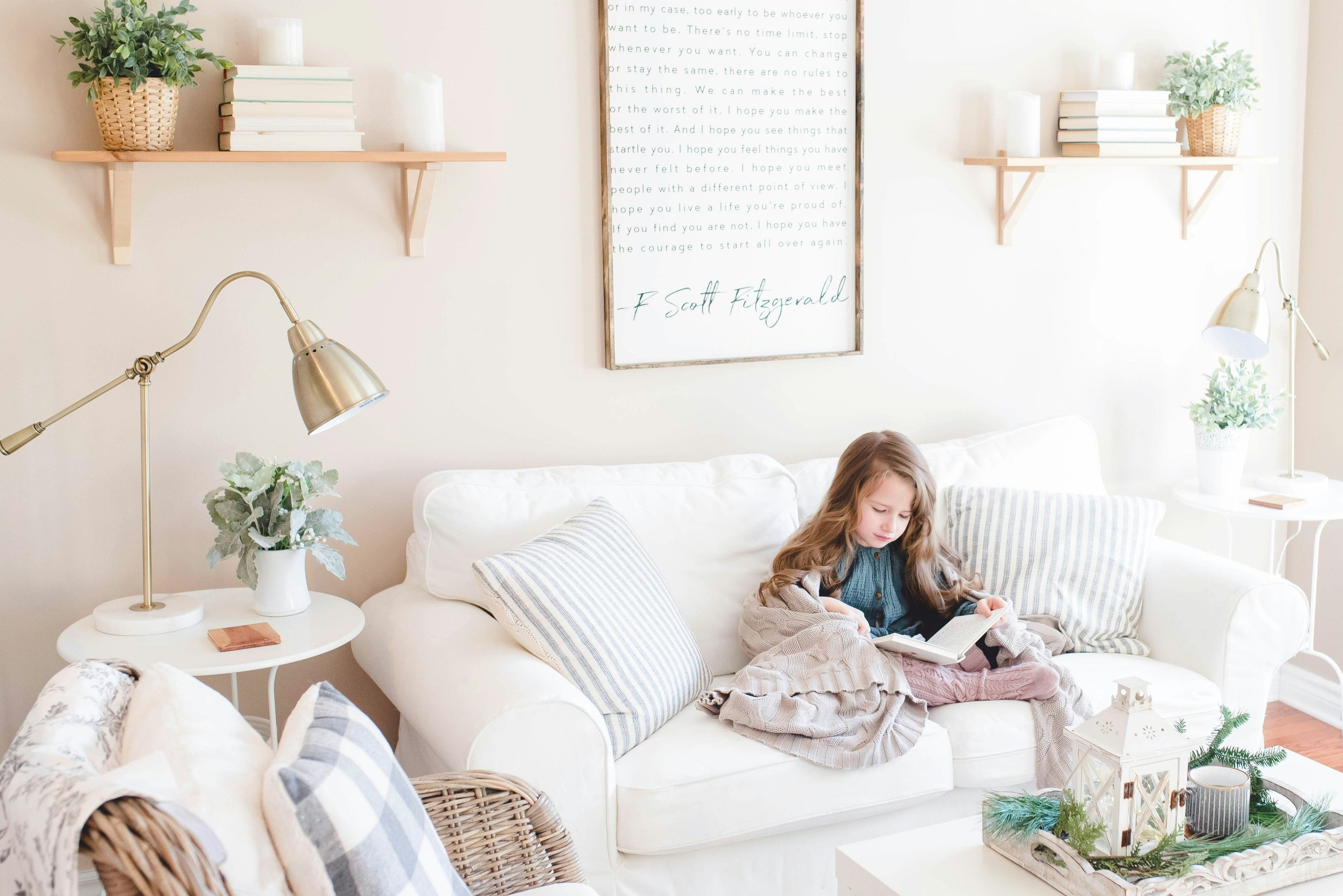 long hair girl in the sofa reading a book